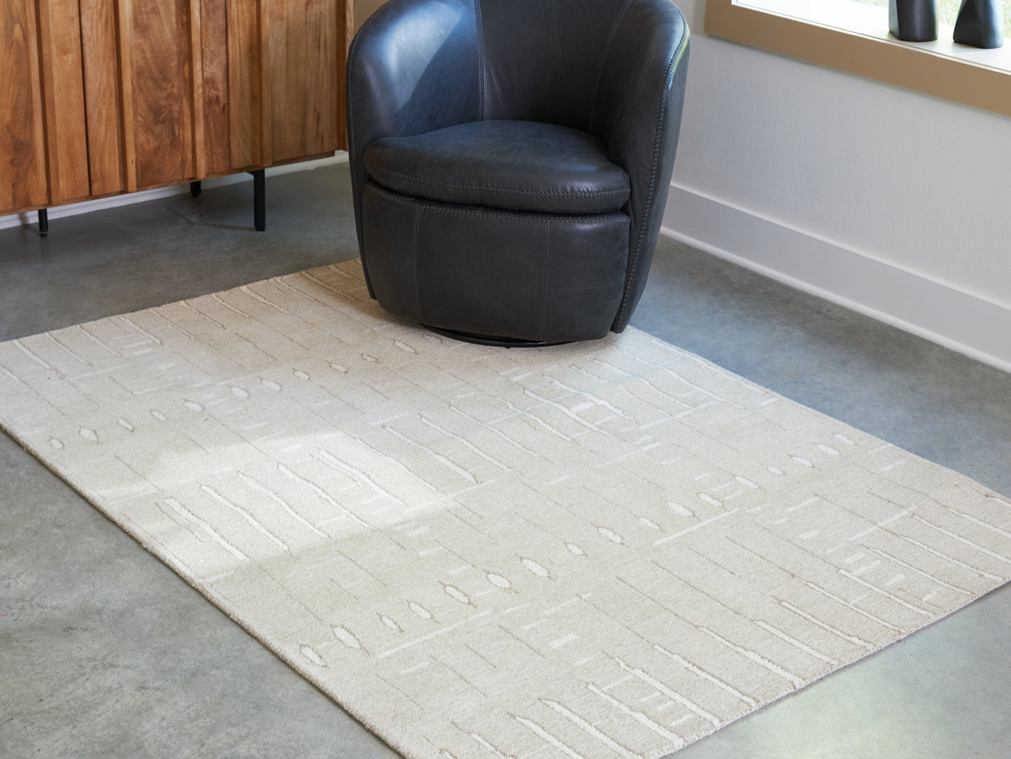 Ashley Express - Wolbert Medium Rug.