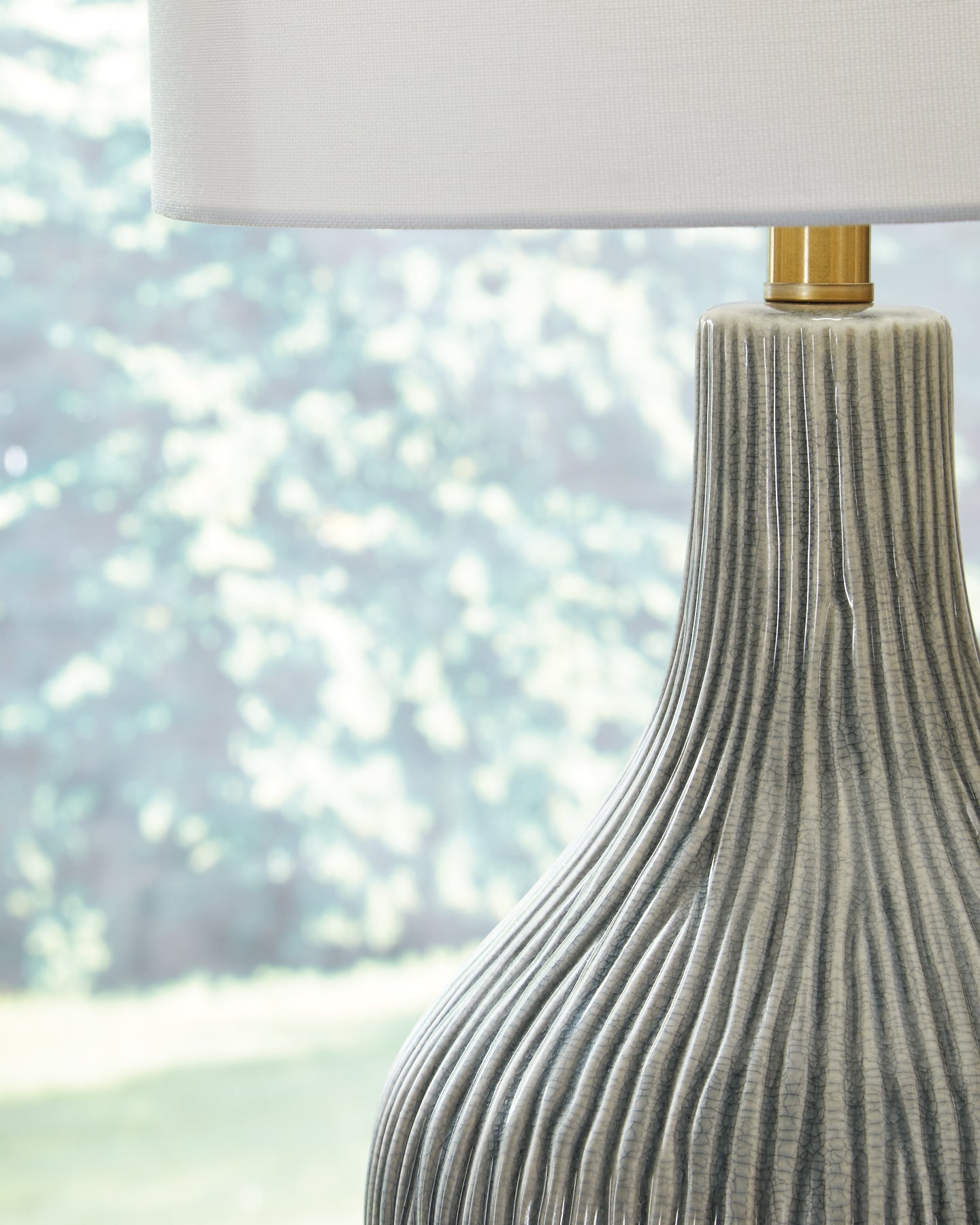 Ashley Express - Judlen Ceramic Table Lamp (1/CN).